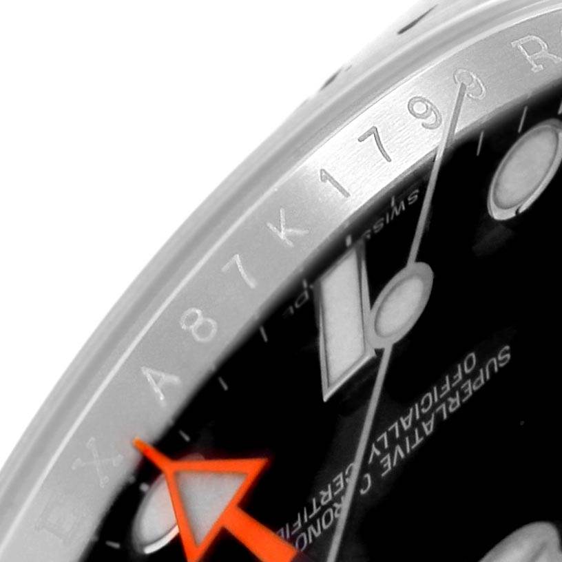 The image shows a close-up of the Rolex Explorer 216570 Men's Stainless Steel Black Dial 216570 Men's Stainless Steel Black Dial watch's face, focusing on the bezel, dial, and hands.