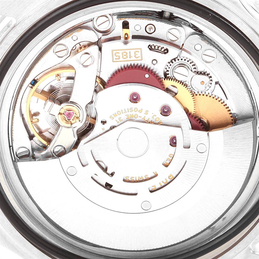 This image shows the internal movement mechanism of a Rolex Explorer 16570 Men's Stainless Steel Black Dial 16570 Men's Stainless Steel Black Dial watch, displaying various gears and components.