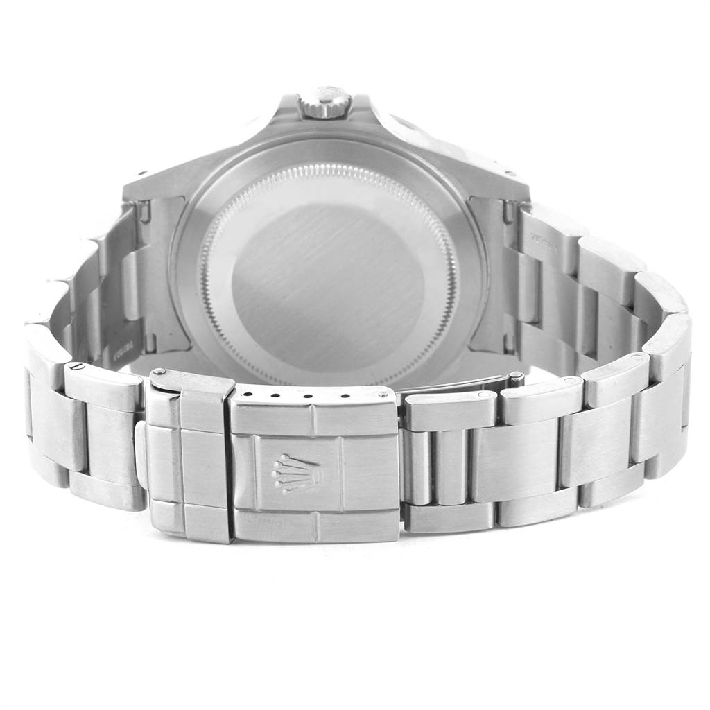 The image shows the back view of a Rolex Explorer 16570 Men's Stainless Steel White Dial 16570 Men's Stainless Steel White Dial watch, featuring the case back and the clasp of the bracelet.