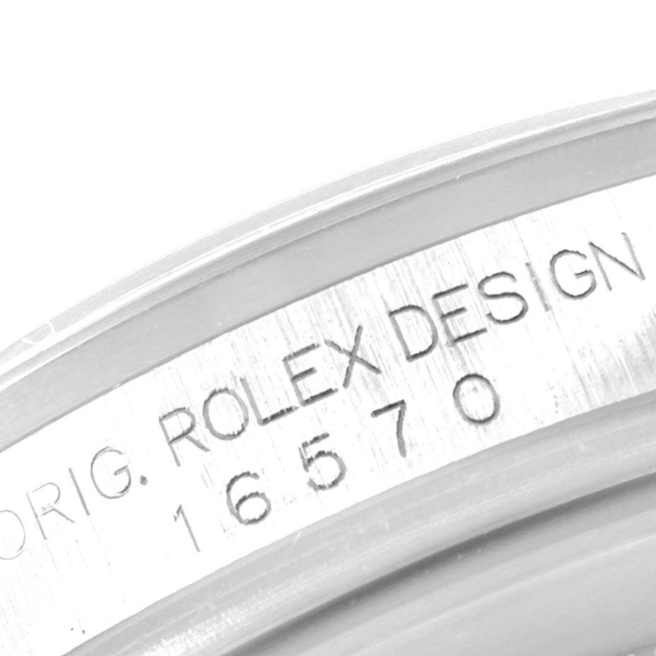 This image shows a close-up of the case with the model number for a Rolex Explorer 16570 Men's Stainless Steel White Dial 16570 Men's Stainless Steel White Dial watch.