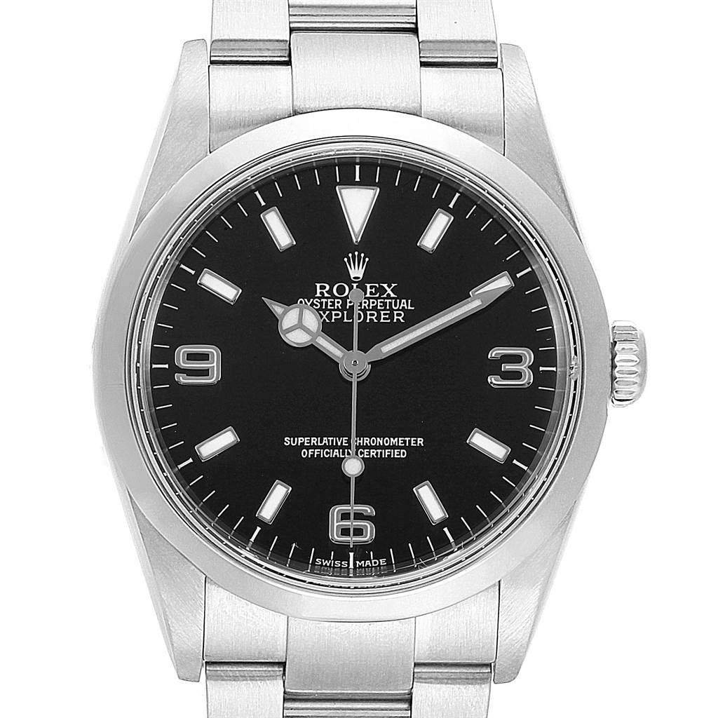 The image shows a front view of a Rolex Explorer Men's Stainless Steel Black Dial Men's Stainless Steel Black Dial watch, displaying its dial, hands, and part of the bracelet.