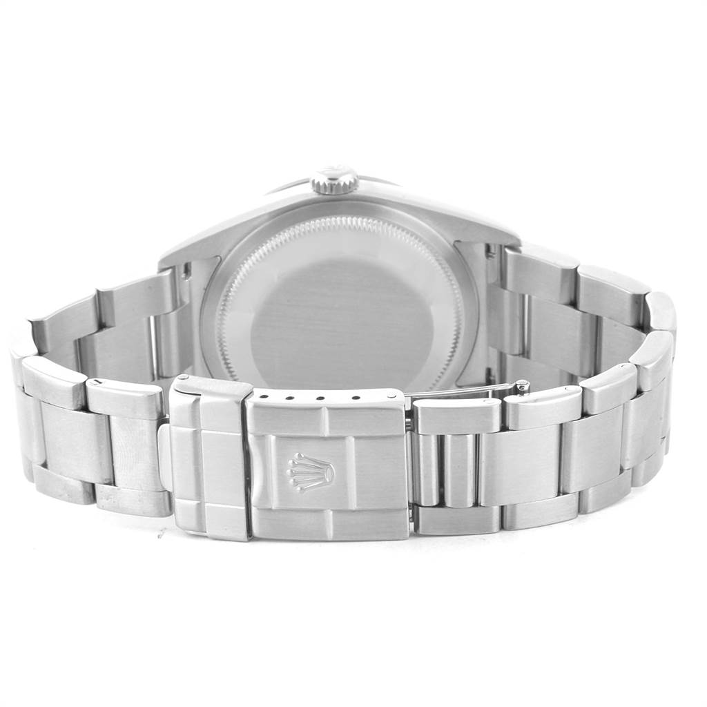 The image shows the back view of a Rolex Explorer Men's Stainless Steel Black Dial Men's Stainless Steel Black Dial watch, highlighting the caseback, bracelet, and clasp with the Rolex logo.