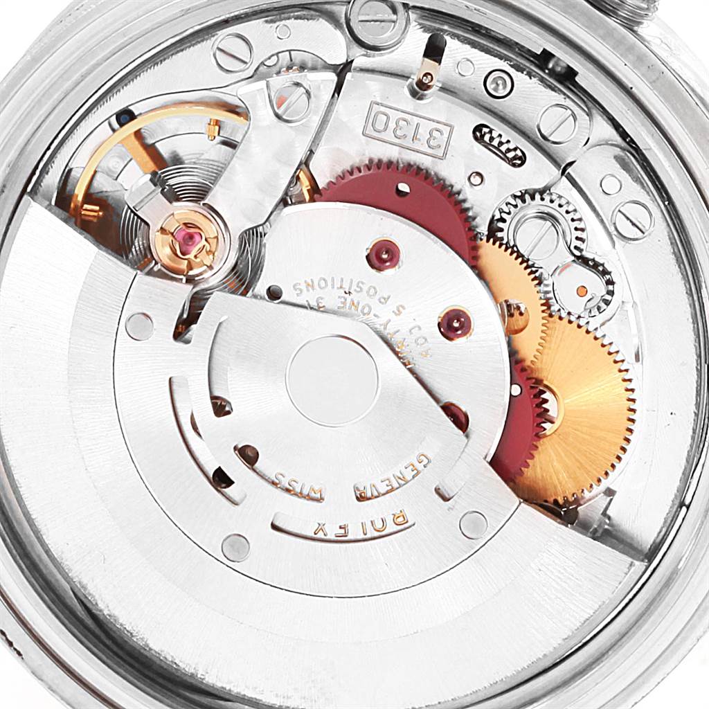 This image shows the intricate internal mechanism of the Rolex Explorer Men's Stainless Steel Black Dial Men's Stainless Steel Black Dial watch, including gears and the balance wheel, viewed from the back.