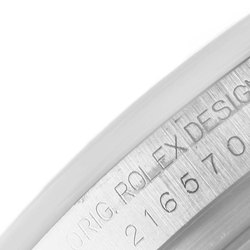 The image shows a close-up of the inner bezel with model details of a Rolex Explorer 216570 Men's Stainless Steel White Dial 216570 Men's Stainless Steel White Dial watch.