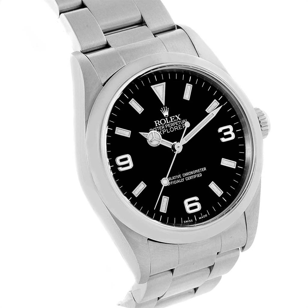 The Rolex Explorer 114270 Men's Stainless Steel Black Dial 114270 Men's Stainless Steel Black Dial watch is shown at a three-quarter angle, highlighting its face, bezel, crown, and part of the bracelet.