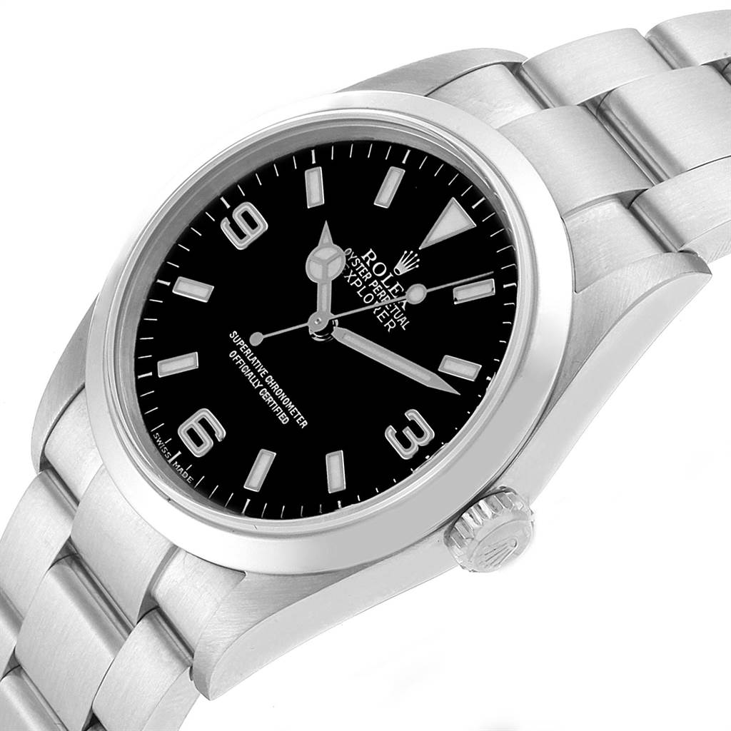 The image shows a Rolex Explorer 114270 Men's Stainless Steel Black Dial 114270 Men's Stainless Steel Black Dial watch at an angled top-down view, highlighting its black dial, stainless steel case, and bracelet.
