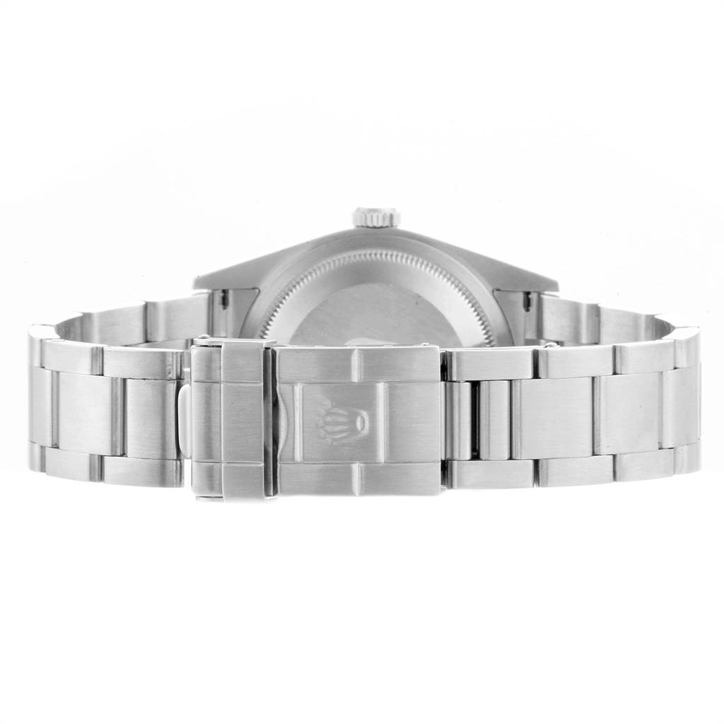 The image shows the back view of a Rolex Explorer 114270 Men's Stainless Steel Black Dial 114270 Men's Stainless Steel Black Dial watch, focusing on its stainless steel bracelet and clasp.