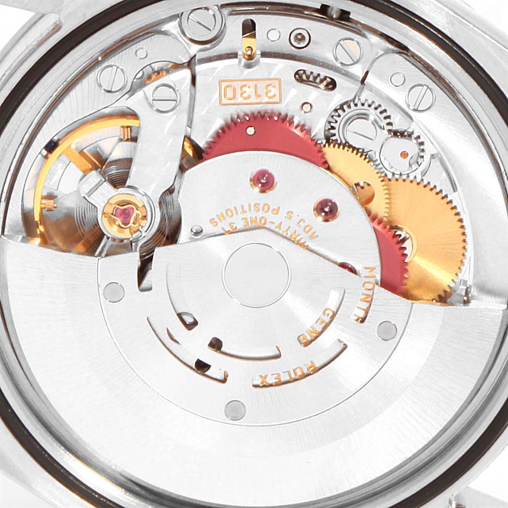 This close-up shot shows the intricate internal mechanics and gearing of the Rolex Explorer 114270 Men's Stainless Steel Black Dial 114270 Men's Stainless Steel Black Dial watch.