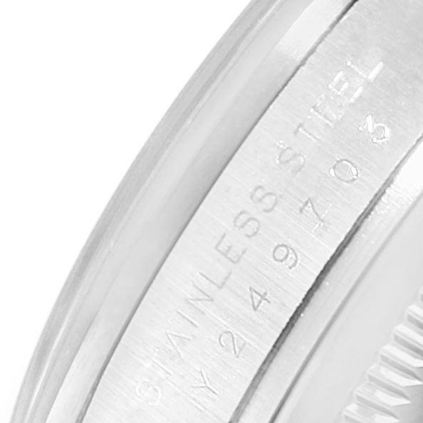 The image shows a close-up angle of the stainless steel caseback of a Rolex Explorer 114270 Men's Stainless Steel Black Dial 114270 Men's Stainless Steel Black Dial watch.