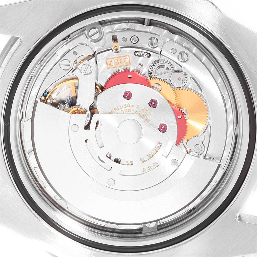 This image shows the back view of a Rolex Explorer 216570 Men's Stainless Steel White Dial 216570 Men's Stainless Steel White Dial watch, revealing its internal mechanical components.