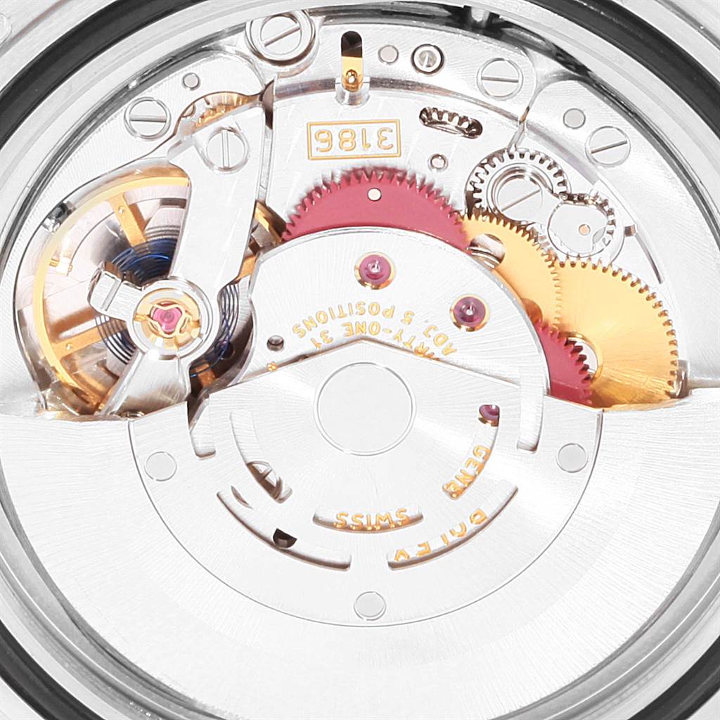 The image shows a close-up view of the Rolex Explorer 16570 Men's Stainless Steel White Dial 16570 Men's Stainless Steel White Dial model's movement, revealing its intricate gears and components.