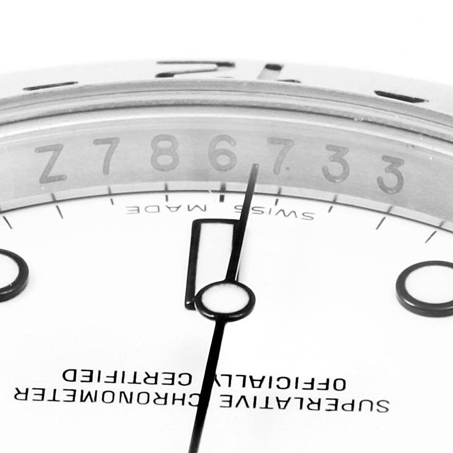 This image shows a close-up view of the dial and hands of a Rolex Explorer 16570 Men
s Stainless Steel White Dial 16570 Men
s Stainless Steel White Dial watch.