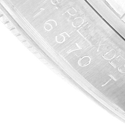 This is a close-up image of the case side and bezel edge of the Rolex Explorer 16570 Men's Stainless Steel Black Dial 16570 Men's Stainless Steel Black Dial watch, showing some engraved text.