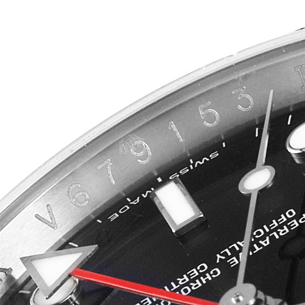 This close-up image of the Rolex Explorer 16570 Men's Stainless Steel Black Dial 16570 Men's Stainless Steel Black Dial watch shows part of the dial, including the hour markers, hands, and edge of the bezel.