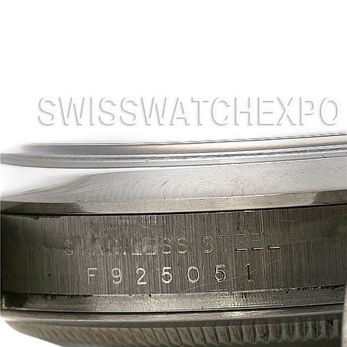 This image shows a close-up of the stainless steel case back and serial number of a Rolex Explorer 114270 Men
s Stainless Steel Black Dial 114270 Men
s Stainless Steel Black Dial watch.