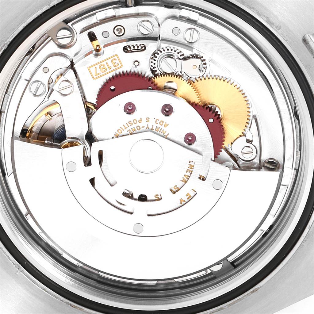 The image shows the intricate internal mechanism of the Rolex Explorer 216570 Men's Stainless Steel White Dial 216570 Men's Stainless Steel White Dial watch from a top-down angle.