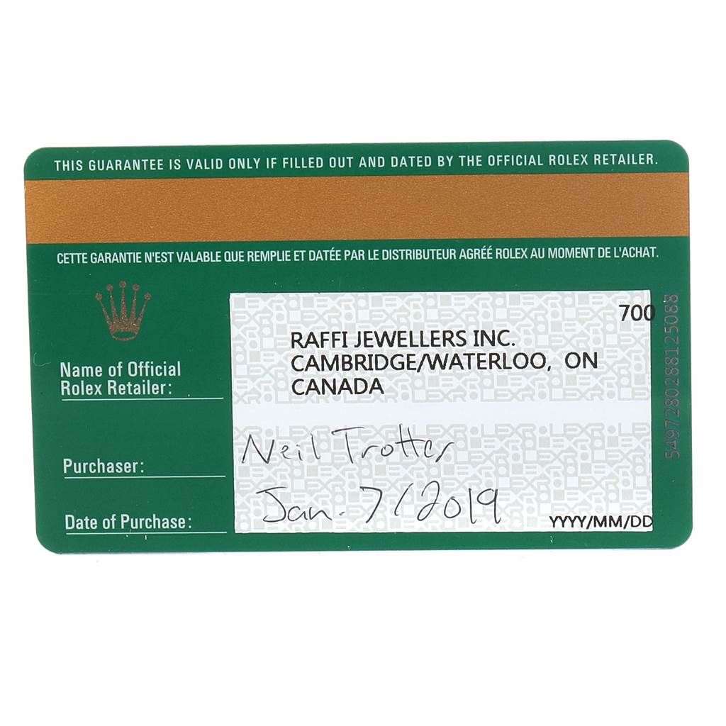 The image shows a warranty card for the Rolex Explorer 216570 Men's Stainless Steel White Dial 216570 Men's Stainless Steel White Dial, including retailer details, purchaser, and purchase date.