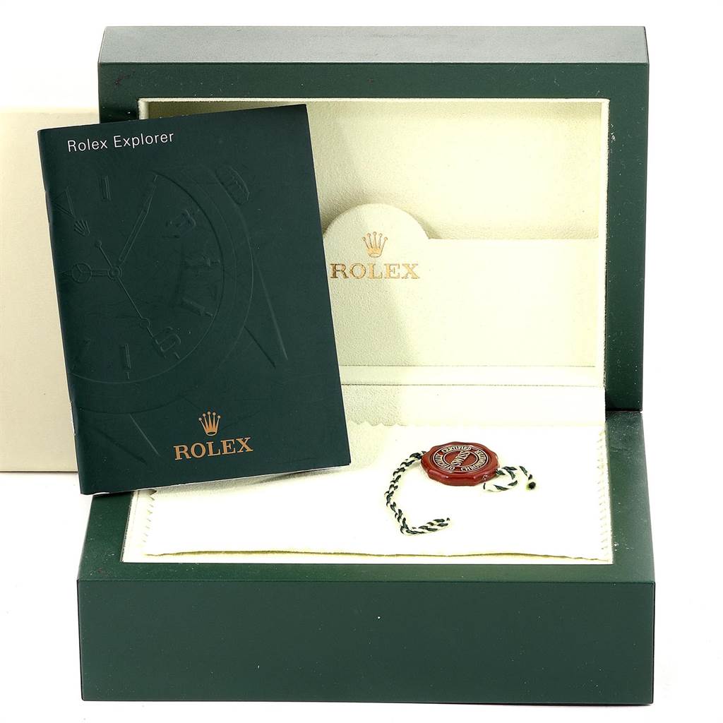 This image shows the Rolex Explorer 114270 Men's Stainless Steel Black Dial 114270 Men's Stainless Steel Black Dial watch box, manual, and hang tag at a front angle.