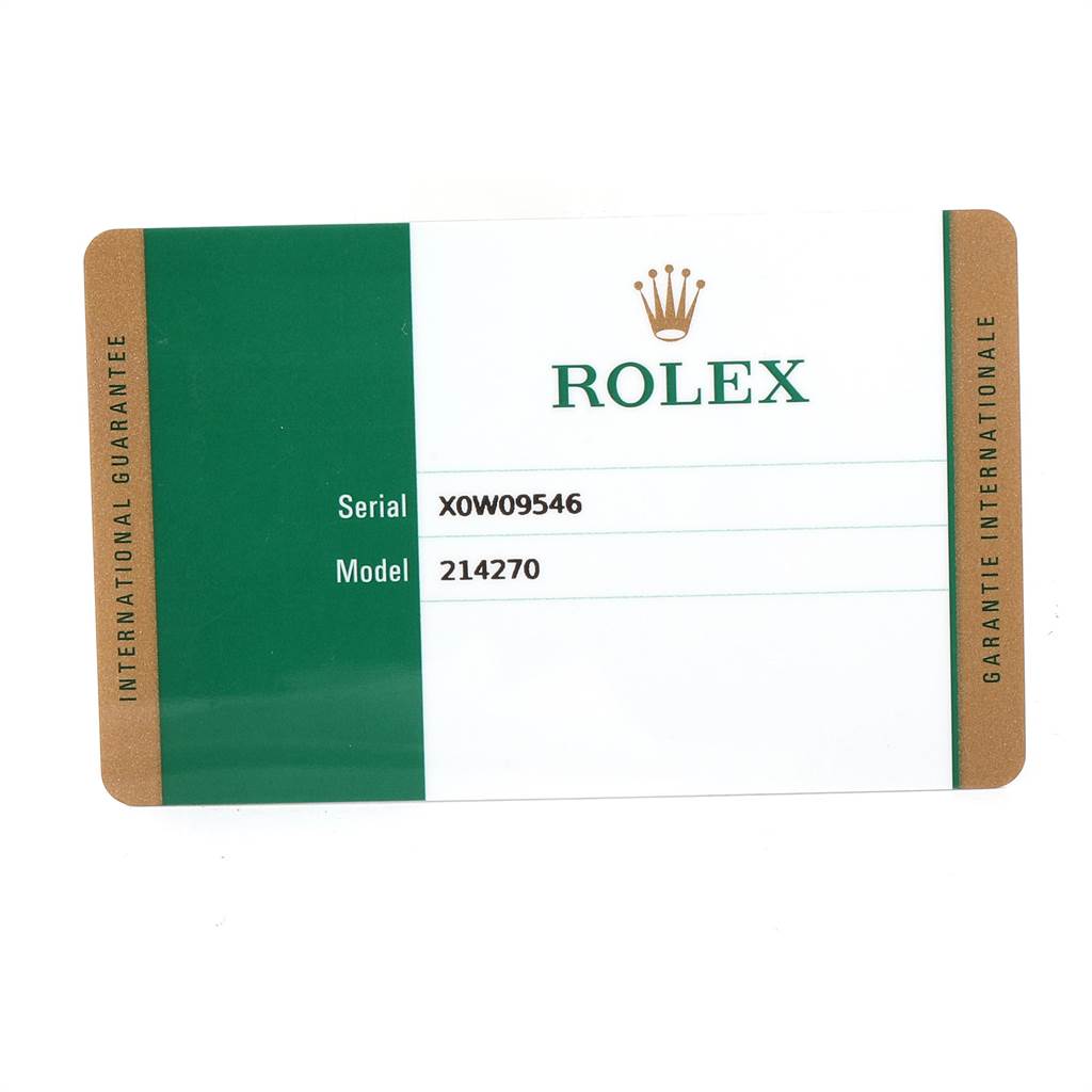 This image shows the warranty card for a Rolex Explorer 214270 Men's Stainless Steel Black Dial 214270 Men's Stainless Steel Black Dial model 214270, including the serial number XOW09546.