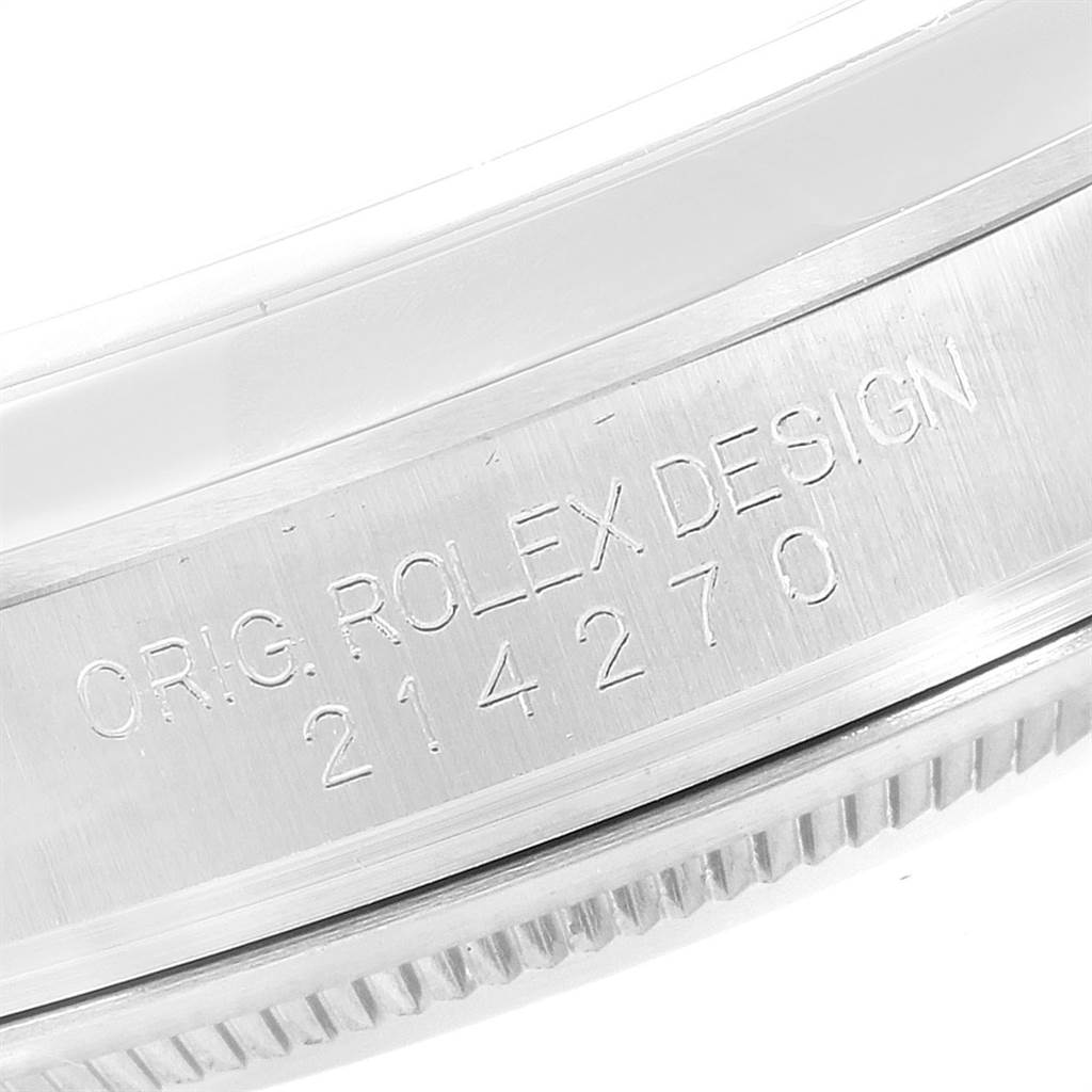 This image shows a close-up of the engraved model number "214270" and "ORIG. ROLEX DESIGN" on the side of a Rolex Explorer 214270 Men's Stainless Steel Black Dial 214270 Men's Stainless Steel Black Dial watch case.