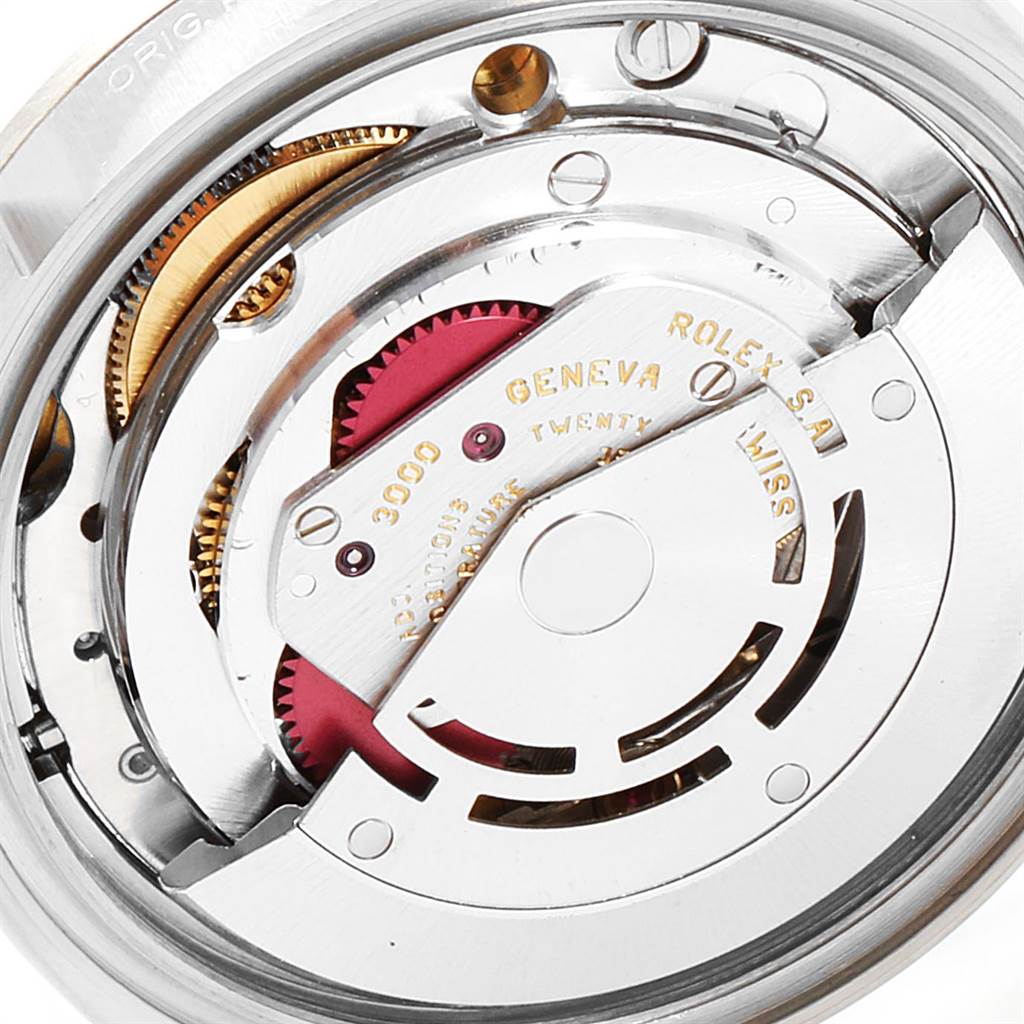 The image shows a close-up of the Rolex Explorer 14270 Men's Stainless Steel Black Dial 14270 Men's Stainless Steel Black Dial watch's internal movement components.