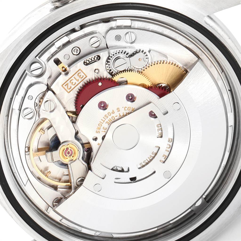 The image shows a close-up view of the movement and intricate gears inside a Rolex Explorer 214270 Men
s Stainless Steel Black Dial 214270 Men
s Stainless Steel Black Dial watch.