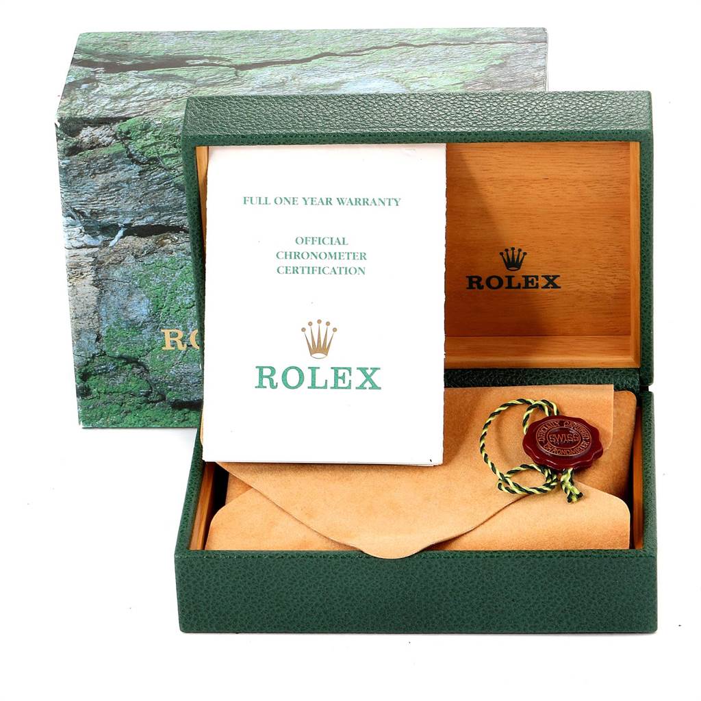 This image shows the box, warranty card, and certification for a Rolex Explorer 16570 Men's Stainless Steel White Dial 16570 Men's Stainless Steel White Dial model watch.