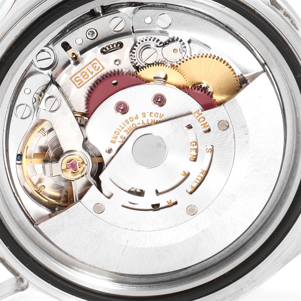 The image shows the intricate internal movement and gears of a Rolex Explorer 16570 Men's Stainless Steel Black Dial 16570 Men's Stainless Steel Black Dial watch.