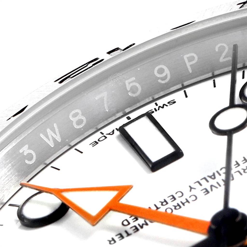 This close-up angle of the Rolex Explorer 23690 Men's Stainless Steel White Dial 23690 Men's Stainless Steel White Dial shows the watch face, part of the dial, and the distinctive orange hand.