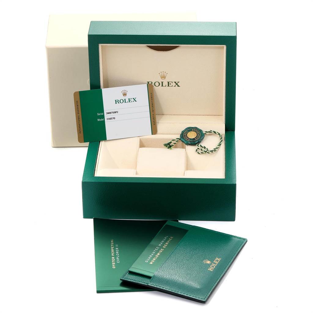 The image shows an open Rolex Explorer 23690 Men's Stainless Steel White Dial 23690 Men's Stainless Steel White Dial watch box, with documentation and accessories including a tag and warranty card.