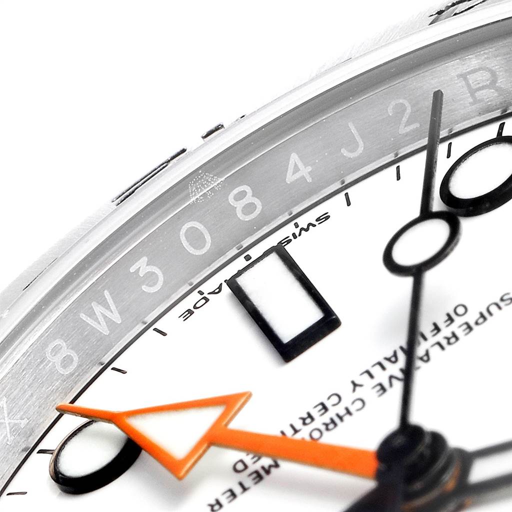 The image shows a close-up of the dial, hour markers, and part of the bezel of the Rolex Explorer 216570 Men's Stainless Steel White Dial 216570 Men's Stainless Steel White Dial watch.