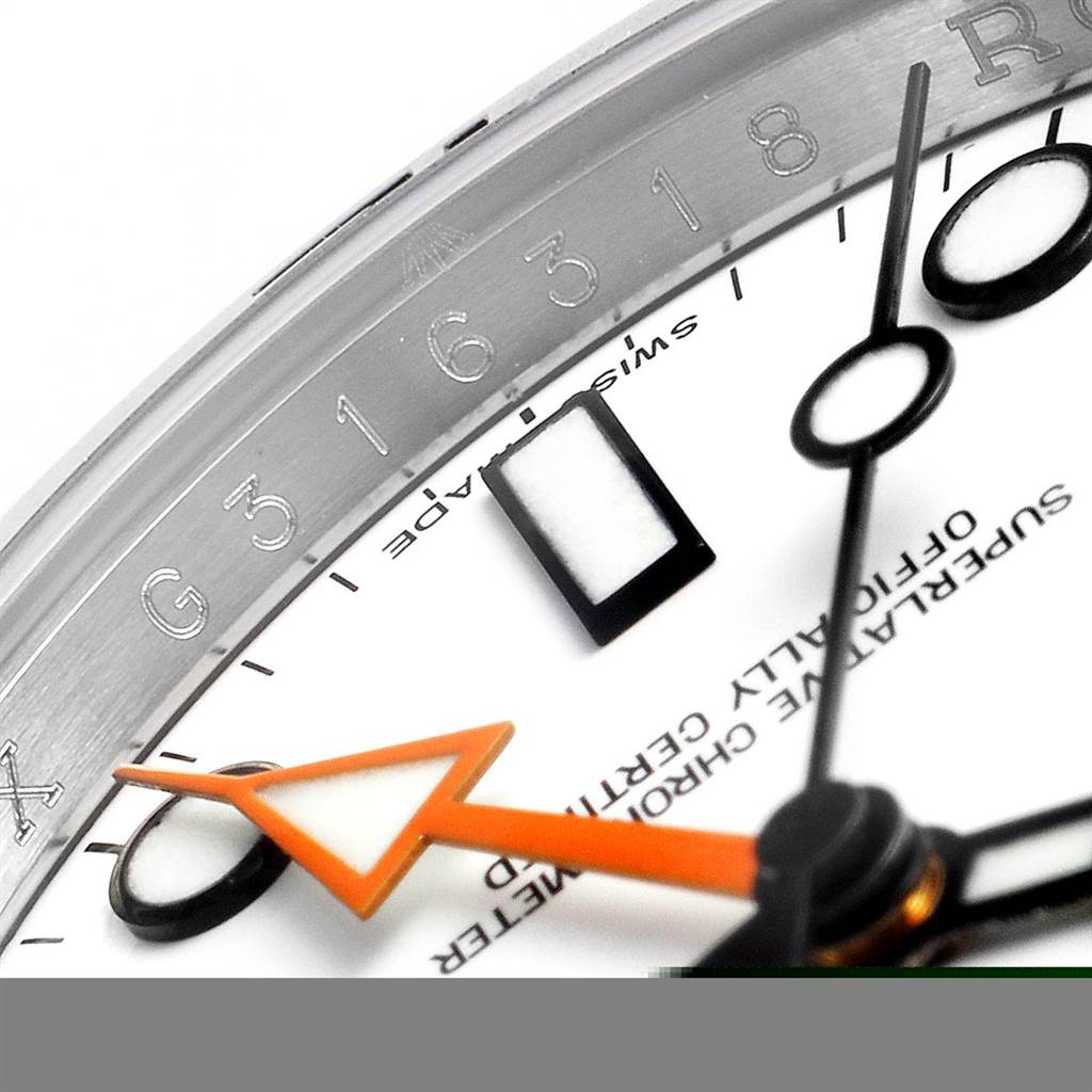 The image shows a close-up of the dial and hands of a Rolex Explorer 216570 Men's Stainless Steel White Dial 216570 Men's Stainless Steel White Dial watch.