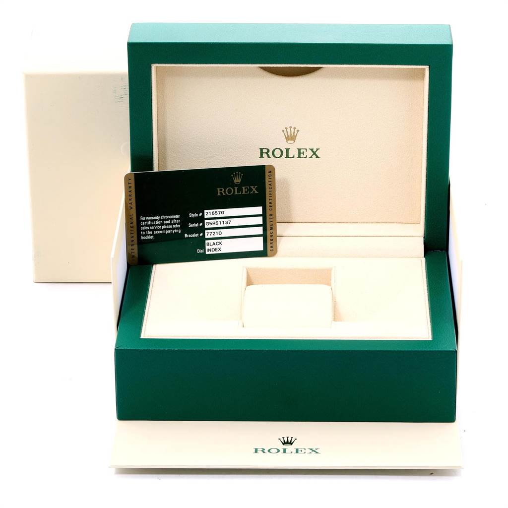The image shows an open Rolex Explorer 216570 Men's Stainless Steel Black Dial 216570 Men's Stainless Steel Black Dial watch box with a warranty card, angled from the front.