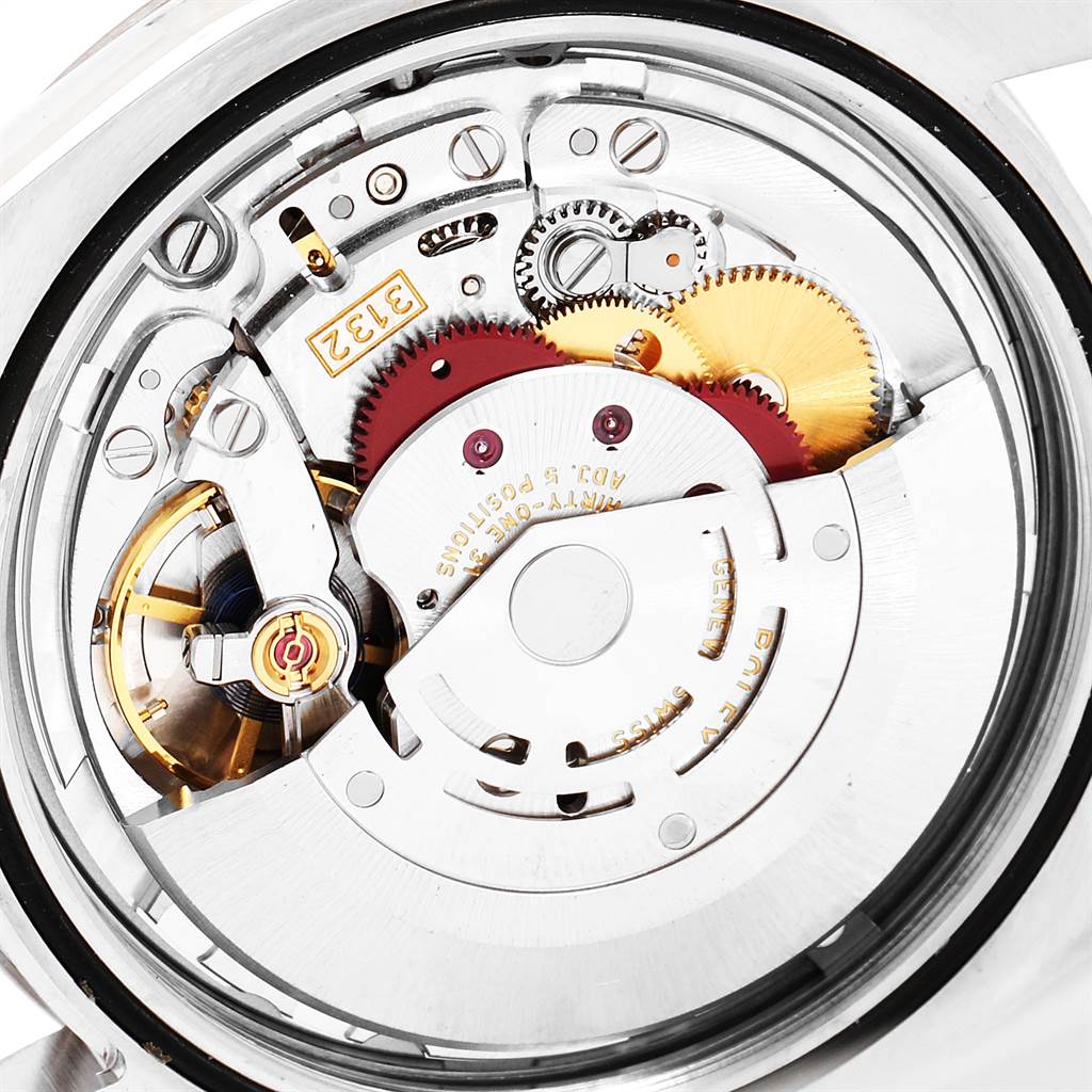 This is a close-up view of the internal movement mechanism of a Rolex Explorer 214270 Men's Stainless Steel Black Dial 214270 Men's Stainless Steel Black Dial watch.