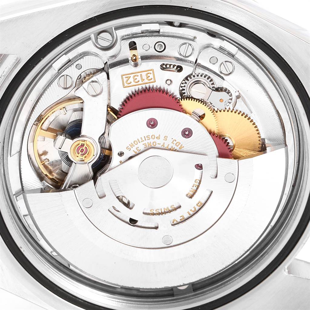 This detailed image shows the internal mechanics of the Rolex Explorer 214270 Men's Stainless Steel Black Dial 214270 Men's Stainless Steel Black Dial model, focusing on its movement components.