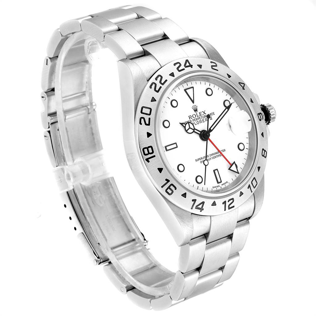 The image shows a side-angle view of a Rolex Explorer 16570 Men
s Stainless Steel White Dial 16570 Men
s Stainless Steel White Dial watch, highlighting the white dial, numerals bezel, and stainless steel bracelet.