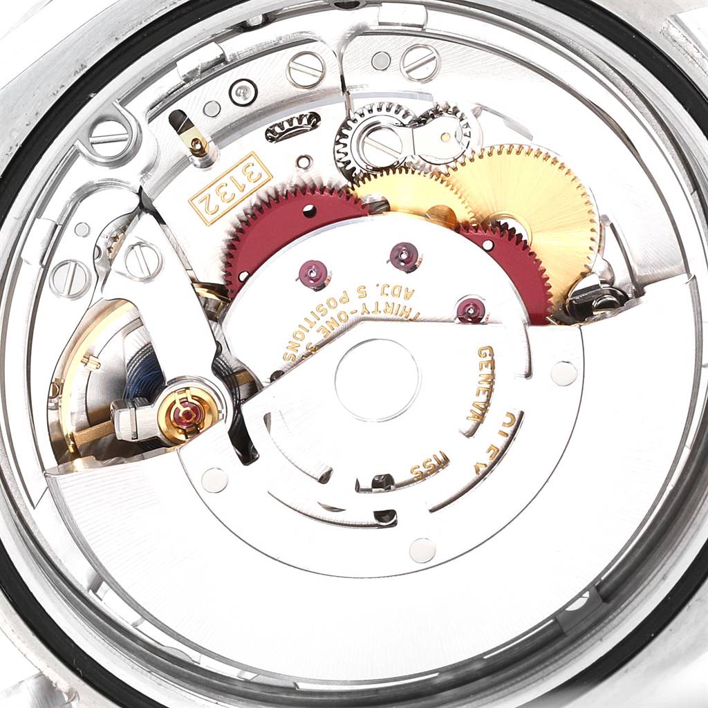 The image shows a close-up of the inner mechanical movement of a Rolex Explorer 214270 Men's Stainless Steel Black Dial 214270 Men's Stainless Steel Black Dial watch.