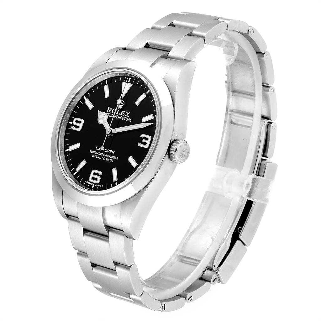 The Rolex Explorer 214270 Men's Stainless Steel Black Dial 214270 Men's Stainless Steel Black Dial watch is shown at an angle displaying its face, crown, and metal bracelet.