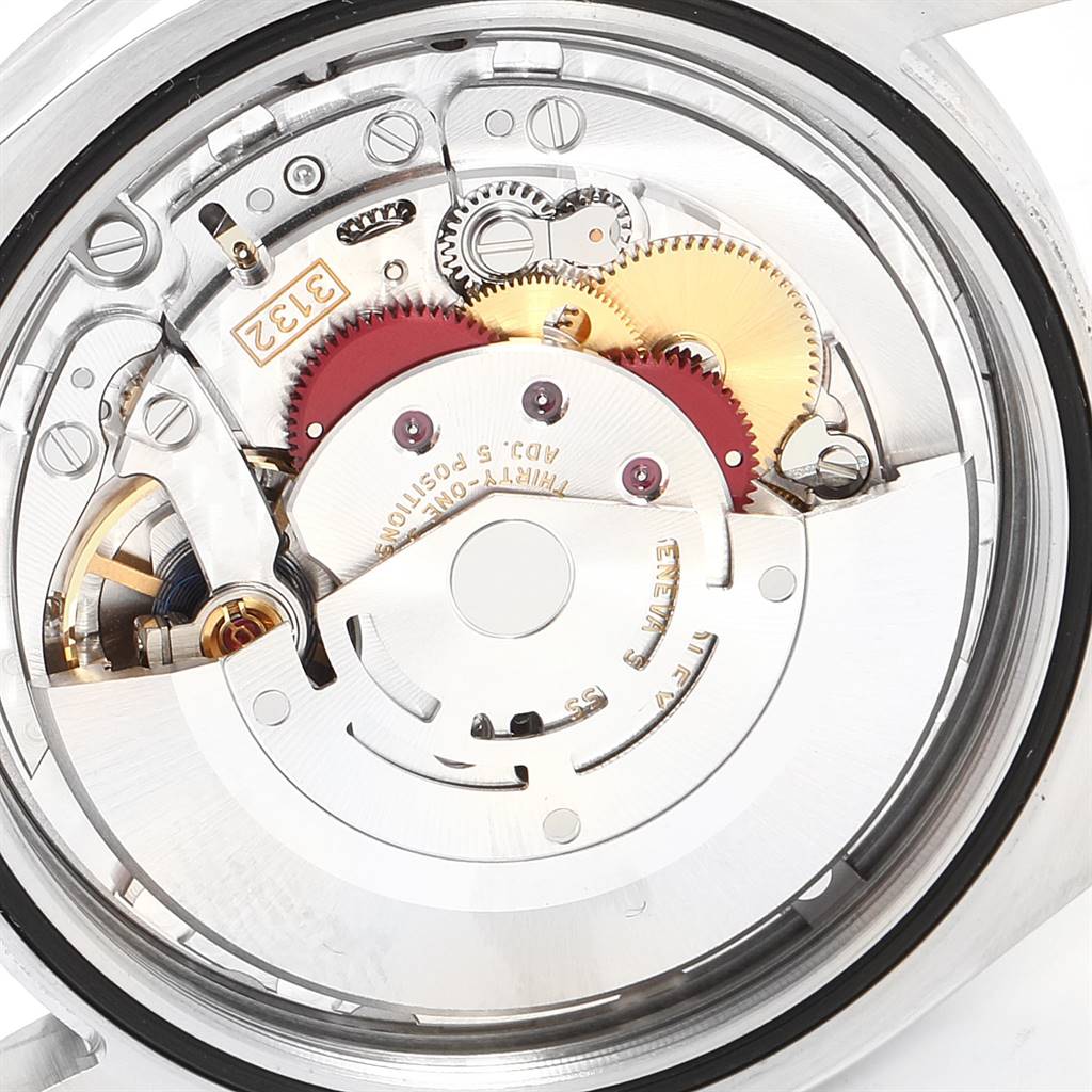 This image shows the internal movement, gears, and mechanisms of a Rolex Explorer 214270 Men's Stainless Steel Black Dial 214270 Men's Stainless Steel Black Dial watch in close-up detail.