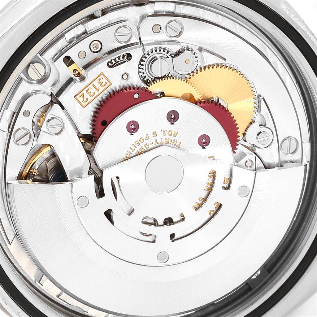 This image shows a close-up of the movement and internal mechanisms of a Rolex Explorer 214270 Men's Stainless Steel Black Dial 214270 Men's Stainless Steel Black Dial watch.
