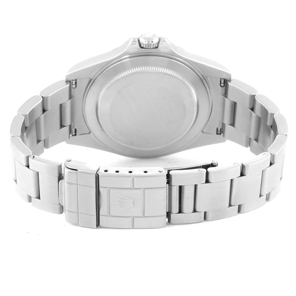 The image shows the back view of a Rolex Explorer 16570 Men's Stainless Steel White Dial 16570 Men's Stainless Steel White Dial watch, highlighting the case back and the clasp on the bracelet.