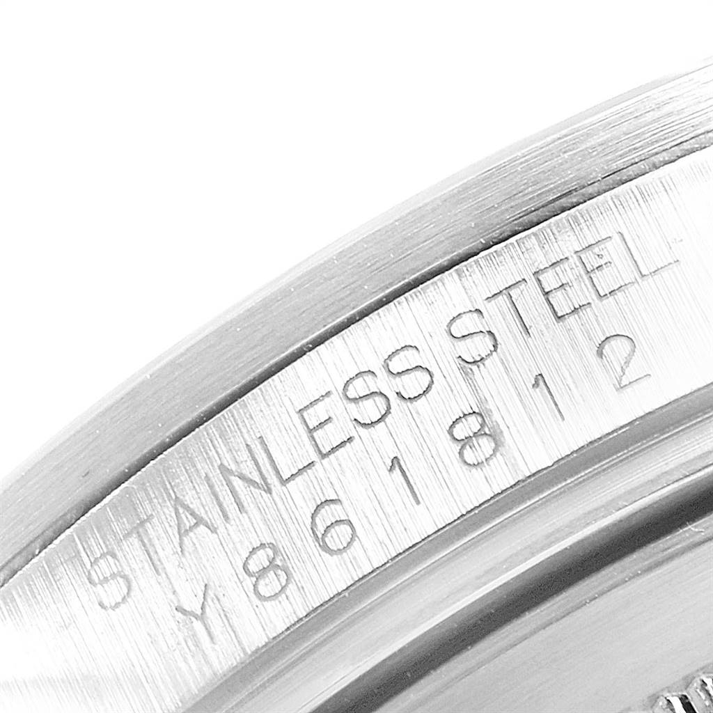 This image shows a close-up of the case's edge and serial number engraving on the stainless steel Rolex Explorer 16570 Men's Stainless Steel White Dial 16570 Men's Stainless Steel White Dial.