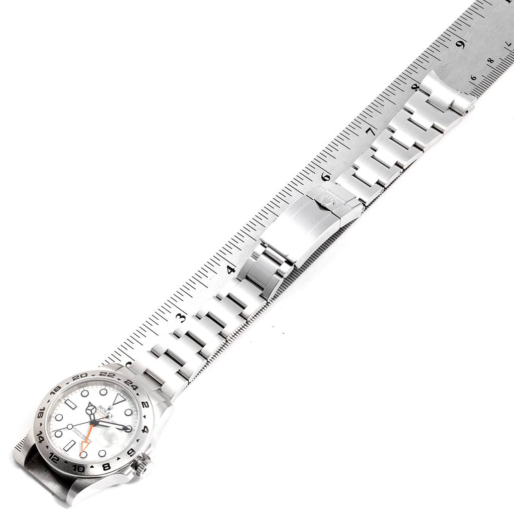 The image shows a Rolex Explorer 216570 Men's Stainless Steel White Dial 216570 Men's Stainless Steel White Dial watch lying flat, featuring the face, bracelet, and clasp, measured against a ruler.