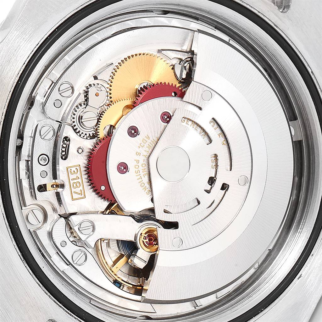 The image shows a close-up of the movement mechanism of a Rolex Explorer 216570 Men's Stainless Steel White Dial 216570 Men's Stainless Steel White Dial watch from the back view.