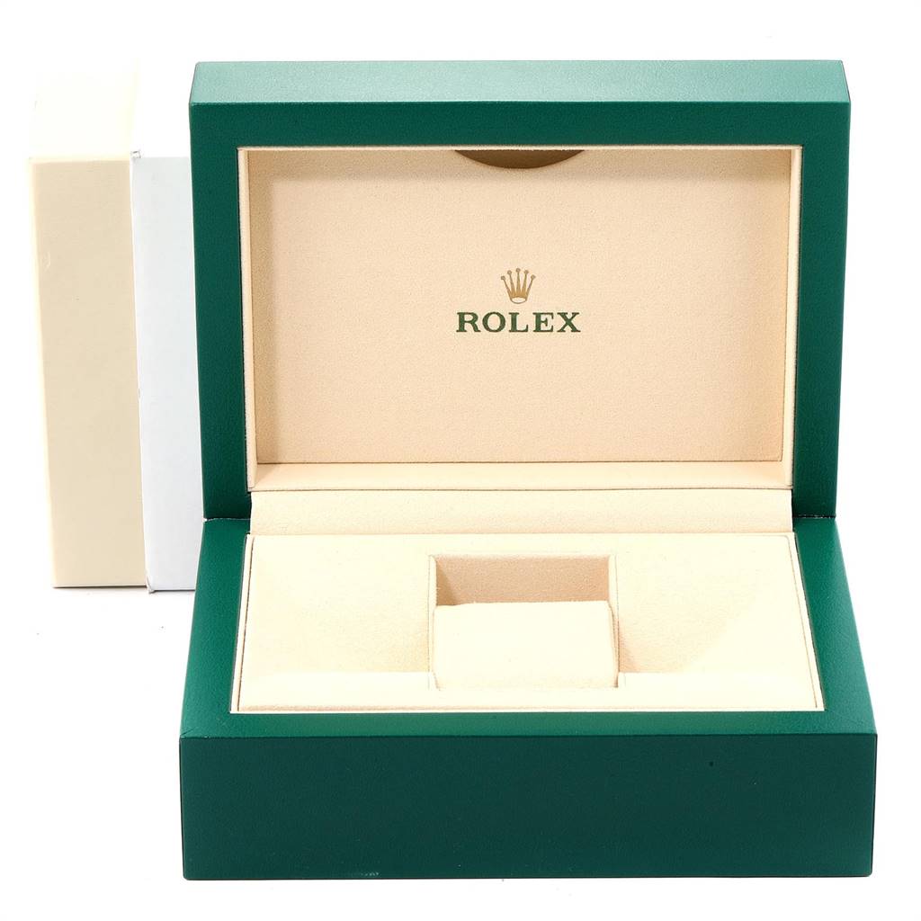 This is an image of an open, empty Rolex Explorer 214270 Men's Stainless Steel Black Dial 214270 Men's Stainless Steel Black Dial watch box, showing the interior beige cushioning and green exterior.