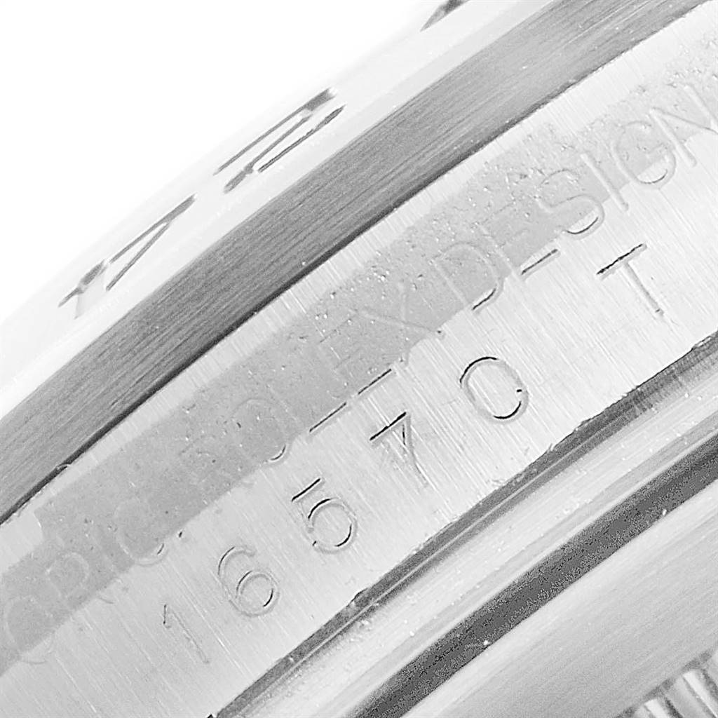 This image shows a close-up view of the engraved inner bezel of a Rolex Explorer 16570 Men's Stainless Steel White Dial 16570 Men's Stainless Steel White Dial watch, featuring the model number 16570.