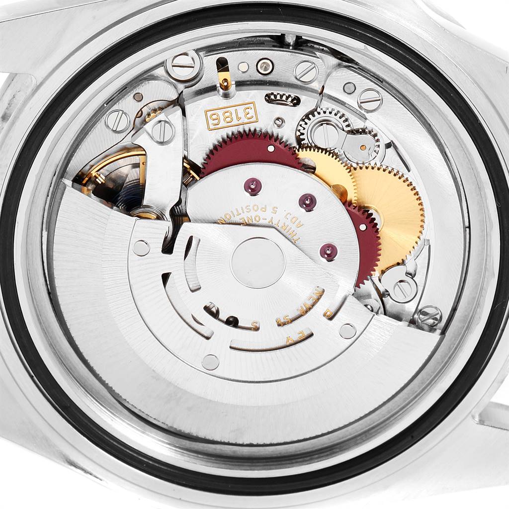 This image shows the internal mechanism of the Rolex Explorer 16570 Men's Stainless Steel White Dial 16570 Men's Stainless Steel White Dial watch from a top-down angle, highlighting gears and other components.