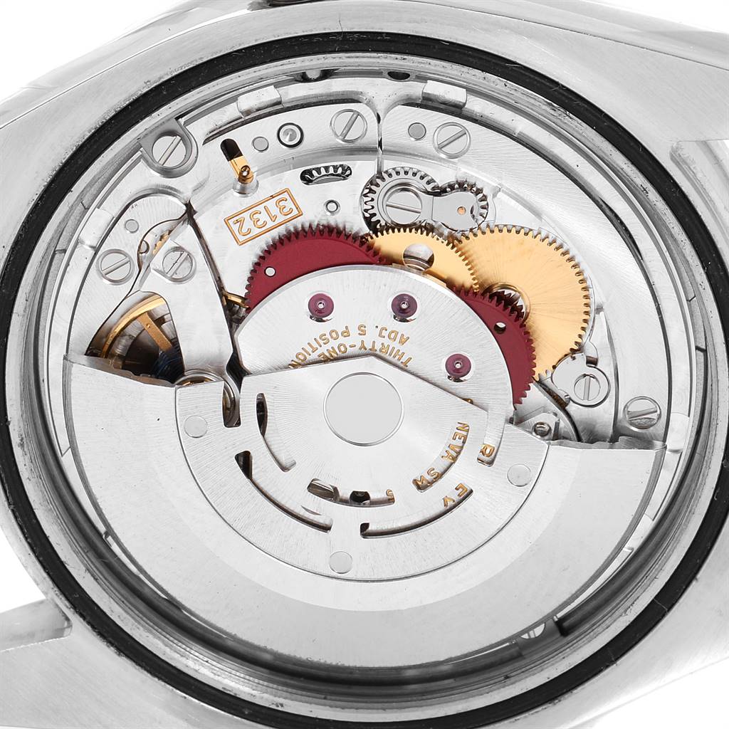 This image shows the internal mechanical movement of the Rolex Explorer 214270 Men's Stainless Steel Black Dial 214270 Men's Stainless Steel Black Dial watch from a rear angle.