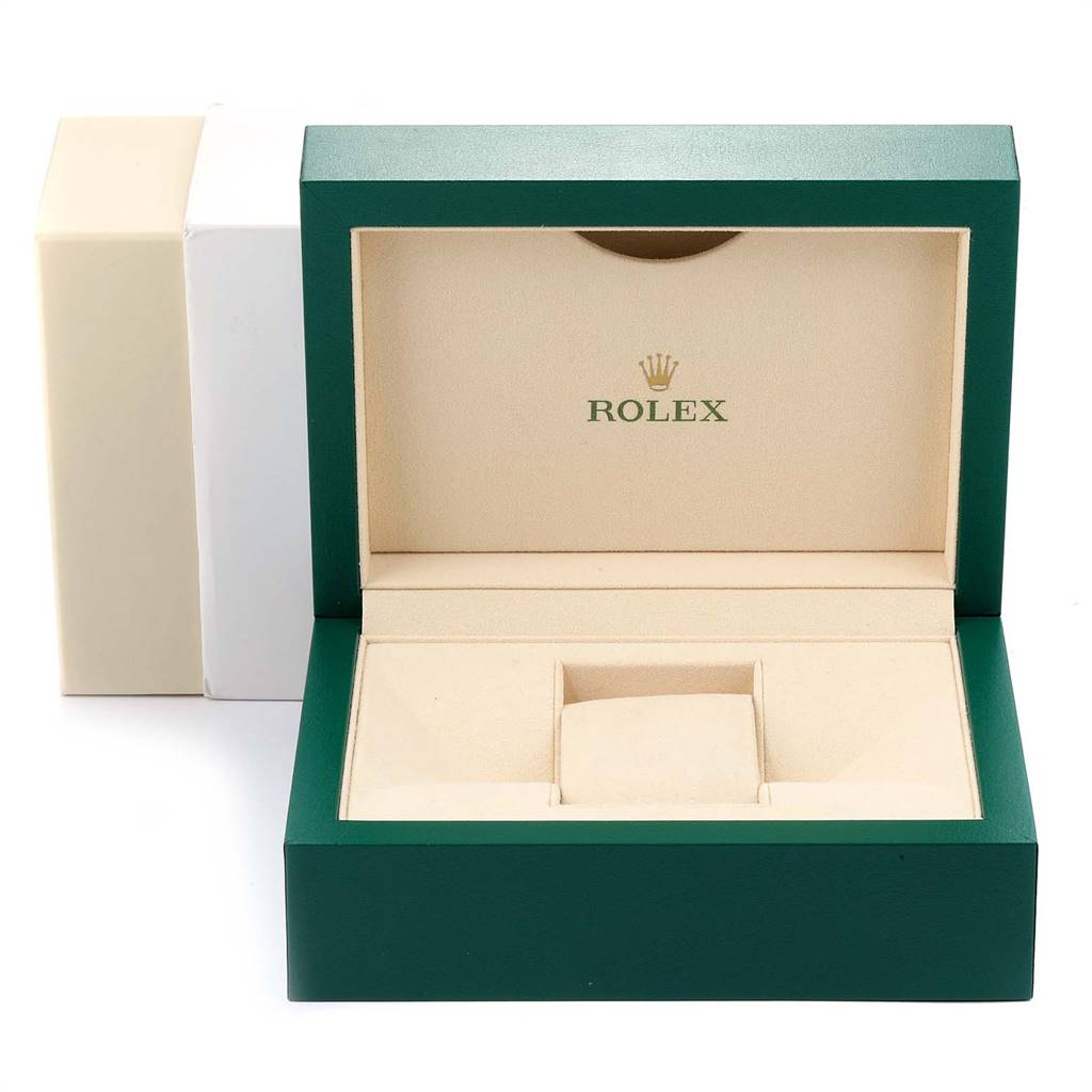 The image shows an open green and beige watch box for the Rolex Explorer 216570 Men's Stainless Steel White Dial 216570 Men's Stainless Steel White Dial model, displaying the interior compartments.