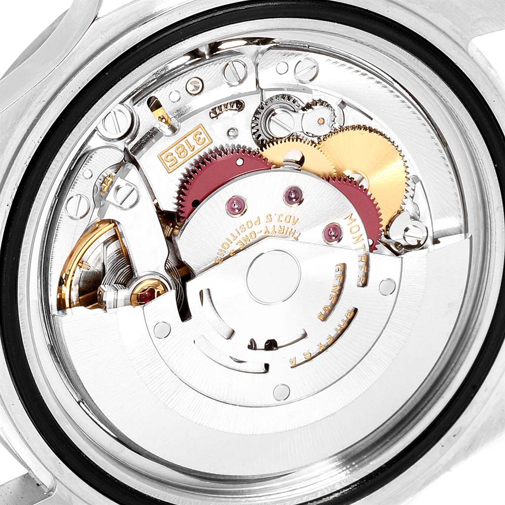 This image shows the internal mechanism of the Rolex Explorer 16570 Men's Stainless Steel White Dial 16570 Men's Stainless Steel White Dial watch from a rear angle, revealing gears and movement parts.